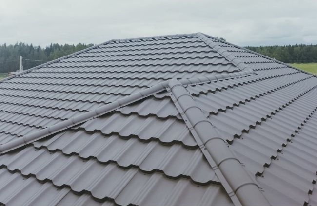 Freshly restored tiled roof in Perth after professional roof painting to improve appearance and weather durability.
